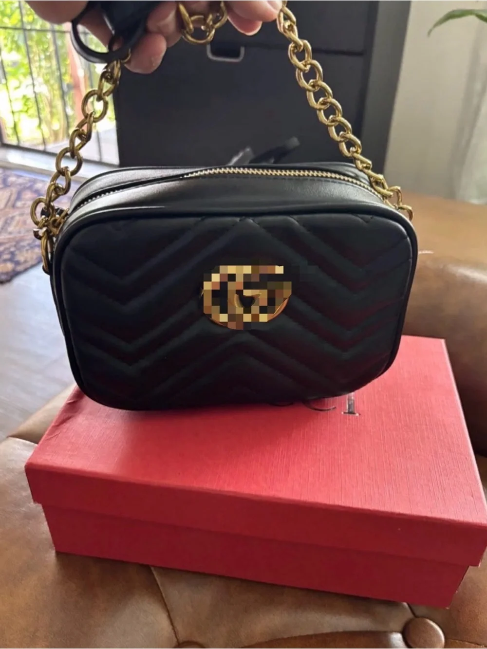 Black Quilted Crossbody Bag with Gold-Tone Chain Strap